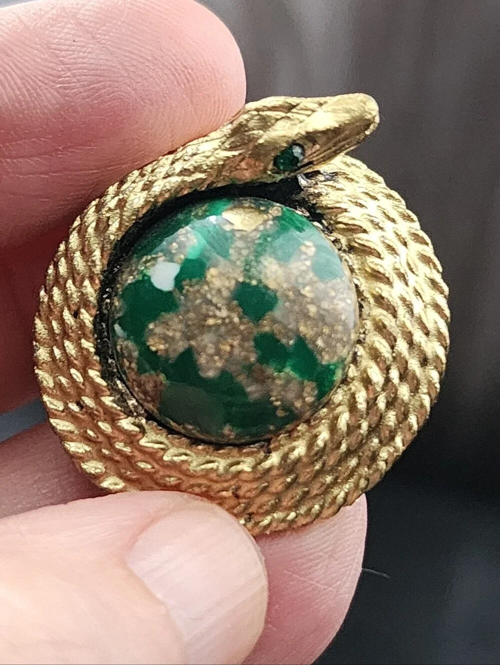 N/A brooch features